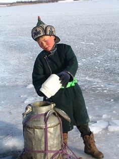 boy getting water in wointer